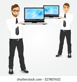 portrait of young successful career man holding his laptop open isolated over white background