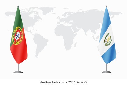 Portugal and Guatemala flags for official meeting against background of world map.