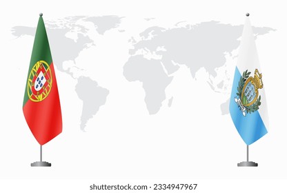 Portugal and San Marino flags for official meeting against background of world map.