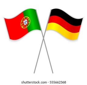 Portuguese and German crossed flags. Portugal combined with Germany isolated on white. Language learning, international business or travel concept.