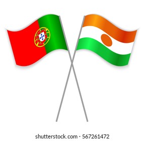 Portuguese and Nigerien crossed flags. Portugal combined with Niger isolated on white. Language learning, international business or travel concept.