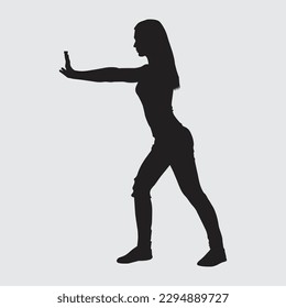  posing as if pushing something forward on white background. Move furniture. Renovate house. Physically fit. silhouette of a woman