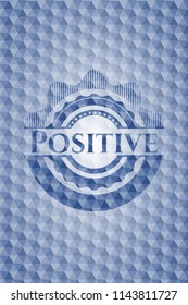 Positive blue badge with geometric pattern.