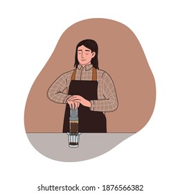 Positive boy barista pressing with hands and brewing black coffee