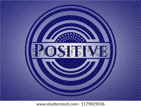 Positive emblem with denim high quality background