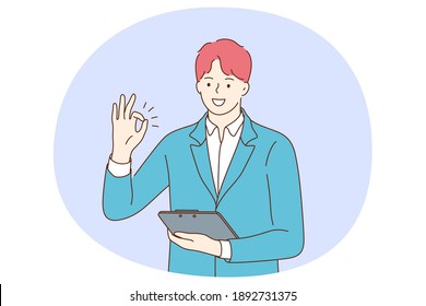 Positive Emotions, Ok Sign And Gesture Language Concept. Young Positive Businessman Cartoon Character Standing With Tablet Or Documents In Hand And Showing Agree Okay Success Sign With Fingers 