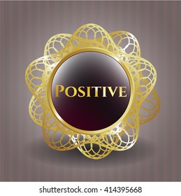 Positive gold emblem or badge
