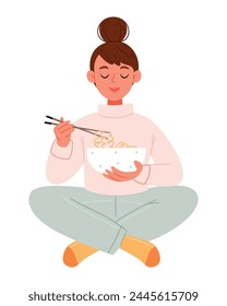  Positive hungry girl sitting eating spaghetti pasta noodles with sauce for dinner at home. Healthy lunch meal supper meal cooked and served in plate