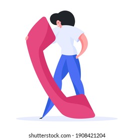 Positive modern lady in blue and white casual outfit standing near large telephone handset and talking with client while working as support agent