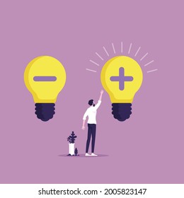 Positive and negative thinking, inspiration and motivation concept, businessman choosing light bulb with plus sign instead of one with minus
