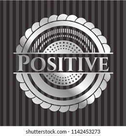 Positive silver emblem