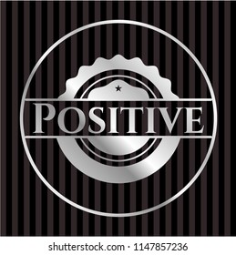 Positive silver emblem