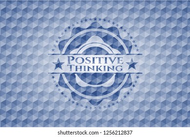 Positive Thinking blue badge with geometric pattern background.