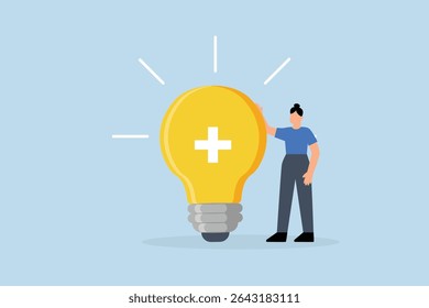 Positive thinking, businesswoman positioned with glowing light bulb concept featuring optimistic symbol. 