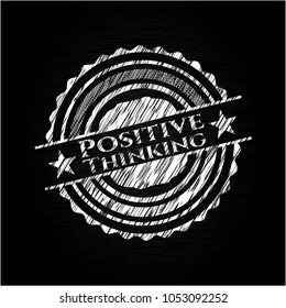 Positive Thinking chalk emblem written on a blackboard