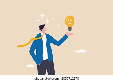 Positive Thinking, Optimistic Mindset Or Good Attitude To Success In Work, Always Get Idea To Solve Any Problems Concept, Happy Businessman Holding Smiling Lightbulb Idea With Positive Vibes Around.