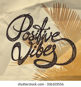 Positive Vibes- hand drawn quote, black on the wrapping paper with palm tree background