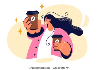 Positive woman with two paper cups for takeaway coffee offers to cheer up to become active for whole day. Happy girl working in coffee shop as waiter or barista holds hot coffee or cappuccino 