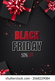 postcard or advertising banner for black friday. Dark background with black gift boxes decorated with a red bow. Flat lay sale concept
