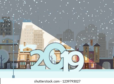 Postcard design with two thousand and nineteen. Numbers under the spotlight on background with snowy winter town. Can be used for postcards, invitations, greeting cards