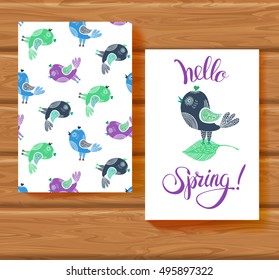Postcard "Hello spring" with birds  in doodle style on wooden background. Vector illustration. 