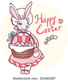 postcard with rabbit holding a basket of Easter eggs