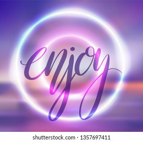 Postcard with a round neon frame, blurred background of sunrise on the sea and Enjoy hand drawn lettering. Brush calligraphy. Vector card for your creativity