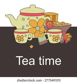 Postcard tea time, mugs and bagels with an kettle, chocolates on the kitchen table 