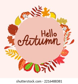 Postcard with the text hello autumn. Autumn leaves around the die.