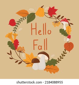Postcard with text Hello Fall. Fallen leaves, mushrooms and pumpkins lying in a circle. Greeting card or Invitation