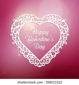 Postcard Valentine's Day. Heart frame with ornate bead and the inscription inside.