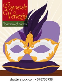 Poster with beautiful colombina mask decorated with purple feathers and gilded pattern over elegant pillow for the celebration of the Carnival of Venice (written in Italian).