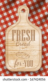 Poster with bread cutting loft wood board lettering fresh bread for you on a red checkered tablecloth.