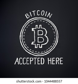 A poster for a cafe is taken bitcoin here painted chalk on a black board. Drawing with living material.