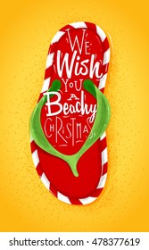 Poster flip flop lettering we wish you a beachy Christmas drawing on sand background