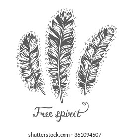 Poster with hand drawn 3 decorative ethnic feathers with text "Free spirit". Freedom concept. Boho and hippie style. American indian motifs. Vector illustration. Tribal theme background with feathers.