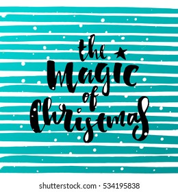 poster with a handwritten inscription. Brush Calligraphy "the magic of christmas" 