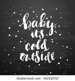 poster with a handwritten inscription. Brush Calligraphy baby it's cold outside