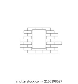 A poster hangs on a brick wall