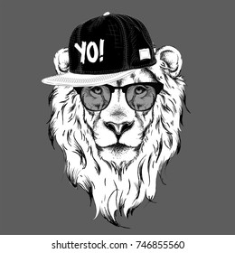 The poster with the image lion portrait in hip-hop hat. Vector illustration.