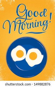 Poster lettering good morning with a blue plate of fried eggs on orange background.