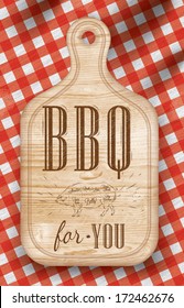 Poster with meat cutting loft wood board lettering BBQ for you on a red checkered tablecloth.