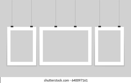 Poster mockup. Vector mock up blank paper hanging on office clip. Paper gallery set on white background.
