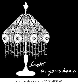 A poster with a picture of an openwork antique table lamp in black and white in different versions. You can also use it as a logo