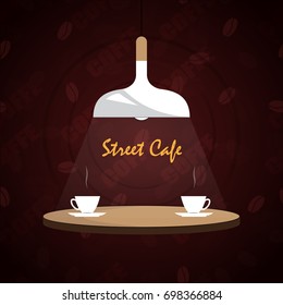 Poster symbolizing the cafe. The lamp hangs over the table with coffee.