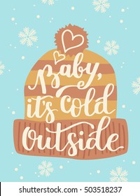 Poster template with hand written quote - Baby, it's cold outside. Winter vector illustration. Warm hat included.