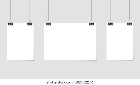 Poster template of a paper sheet. Hanging posters Set.