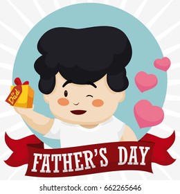 Poster with tender dad holding his special gift and celebrating Father's Day behind a greeting ribbon and a floating hearts.