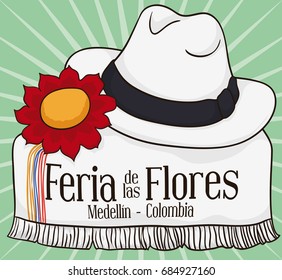 Poster with traditional Colombian elements to celebrate Festival of the Flowers (written in Spanish): poncho, red flower and arriero's hat.