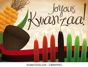 Poster with traditional lighted candles, flag, wooden cup and corn to celebrate Kwanzaa in December.